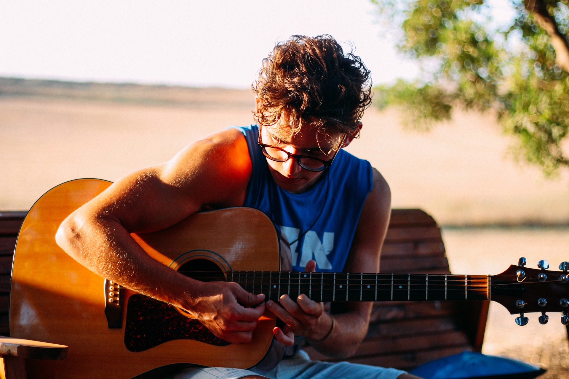 Playing guitar at the beach